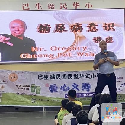 Greg giving a diabetes awareness talk at a Chinese primary school